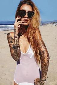 sexy beauty playing tattoo art