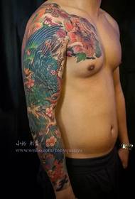 Phoenix bloem arm tattoo patroon