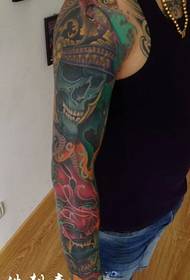 Ghost warrior bloem arm tattoo patroon