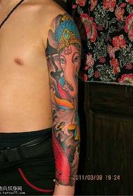 Elephant squid flower arm tattoo pattern