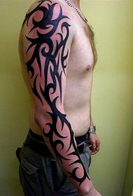 Stylish handsome totem flower arm tattoo
