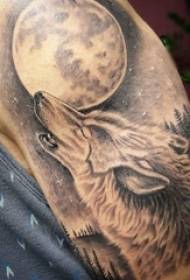ذراع الصبي على نقطة رسم رمادية سوداء شوكة الذئب والقمر صورة ذراع زهرة الوشم