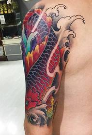 Farebné kvetinové rameno chobotnice s lotosovým tetovaním