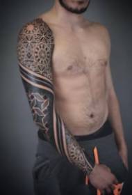 Men's handsome black prickly totem flower arm tattoo works