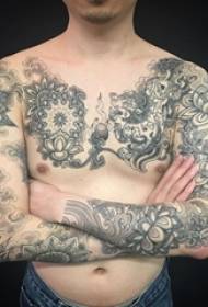 Dominujący kreatywny czarny szkic smoka totem kwiat ramię tatuaż wzór