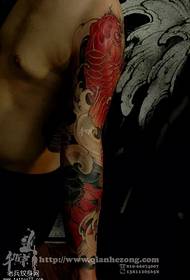 Кальмар лотос гүлінің татуировкасы үлгісі