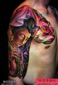 Tetovania Guanyin Lotus s polofarebnými farbami zdieľajú tetovania