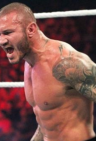 Le champion des poids lourds de la WWE, Randy Orton, tatouage du bras de la fleur gauche