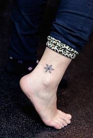 voet mooie kleine totem tattoo