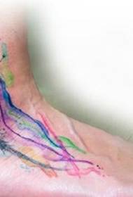 Tatouage couleur splash à la cheville