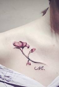 girl under the clavicle of English and flower tattoo tattoo
