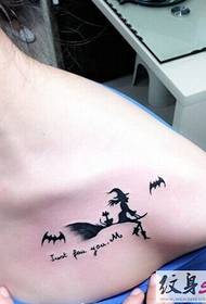 playful little tattoo on the collarbone