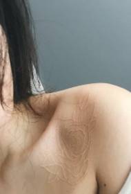 kagandahan clavicle invisible rose tattoo pattern