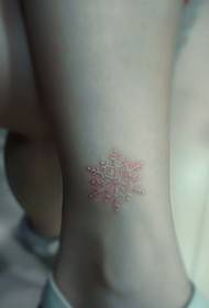 Tatwaġġ tad-demm tal-ħamiem pjuttost tal-snowflake