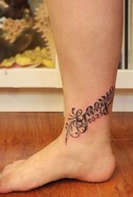 Tatwaġġ Ingliż eleganti sempliċi bl-għaksa