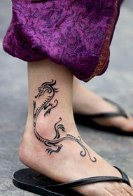 the totem dragon tattoo of Peugeot at the girl's ankle