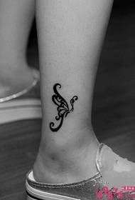 black and white butterfly totem ankle tattoo