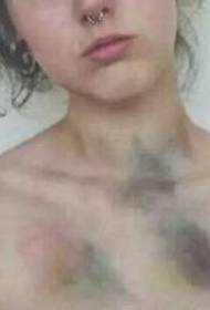 Bruise Tattoo at the Clavicle