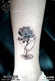 Nwanyi isi Lotus Tattoo Iwu