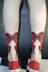tatouage arcade jambe rouge