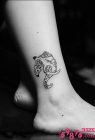 Black and white elephant head and ankle tattoo