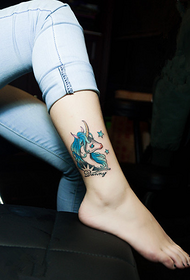 cute unicorn tattoo at the female ankle
