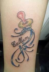tatuaggio ciuccio alla caviglia