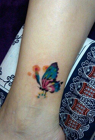 foot-eyed pekný farebný motýľ tetovanie vzor
