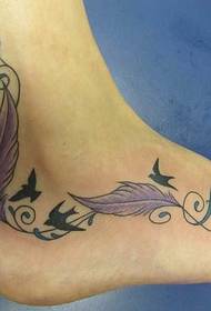 ankel prachtich feather tattoo patroan