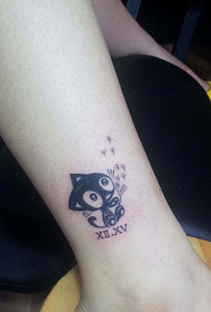kitten tattoo at the ankle