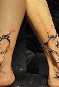 totem lánúin rúitín lánúineacha le hoibreacha tattoo Dragon