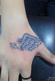 girl's back half wing tattoo tattoo pattern