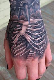 mão volta personalidade osso coração tatuagem