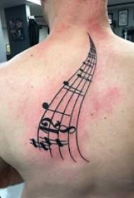 Tattoo Musical note pattern on the back of the boy on the black note tattoo picture