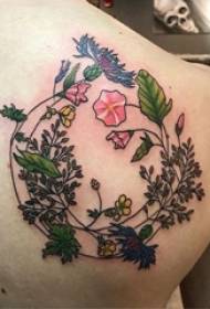 tatouage dos garçons masculins sur le dos de fleurs colorées images de tatouage