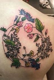 wiilasha dhabarka loo yaqaan 'tattoo tattoo' oo ku yaal dhabarka sawirada tattoo ubax midab leh