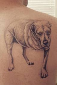 Immagine del tatuaggio del cucciolo ragazzo sul retro dell'immagine del tatuaggio del cucciolo grigio nero