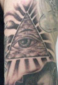 piramide geometrica con motivo a tatuaggio ad occhio