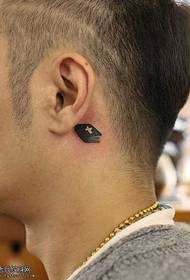 auss mazs, tīrs grāmatas tetovējums