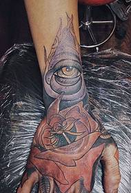 ручни леђа узорак тетоваже с очима и цвијећем