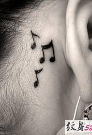 cute little ear tattoo