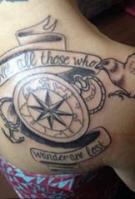 Tattoo Compass Boy sul retro dell'uccello e bussola tatuaggio immagine