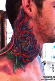 a beautiful chrysanthemum tattoo pattern on the neck of the man