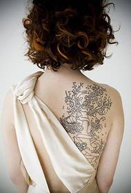 ένα κορίτσι σέξι πίσω ροδάκινο δέντρο όμορφο τατουάζ