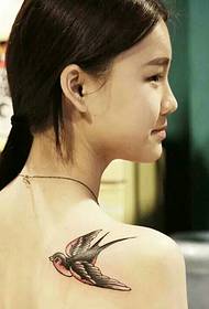 a free and cute little swallow tattoo