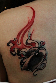 girls back shoulders tattoo of flame love love small flame