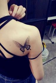 katahum itom nga grey butterfly tattoo