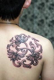 Retounen sou trezò a nan travay la tatoo lotus