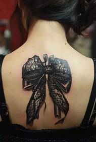 Mma azu Nnukwu lace bow tattoo