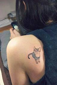 Girl's cute kitten tattoo on the shoulder